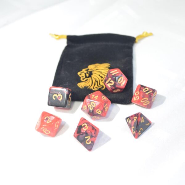 red and black standard sized dice with lion dice ba